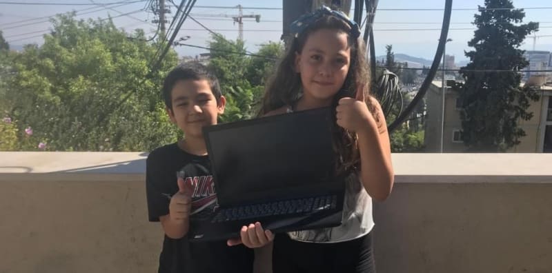 Children with laptop from Pentecost Challenge
